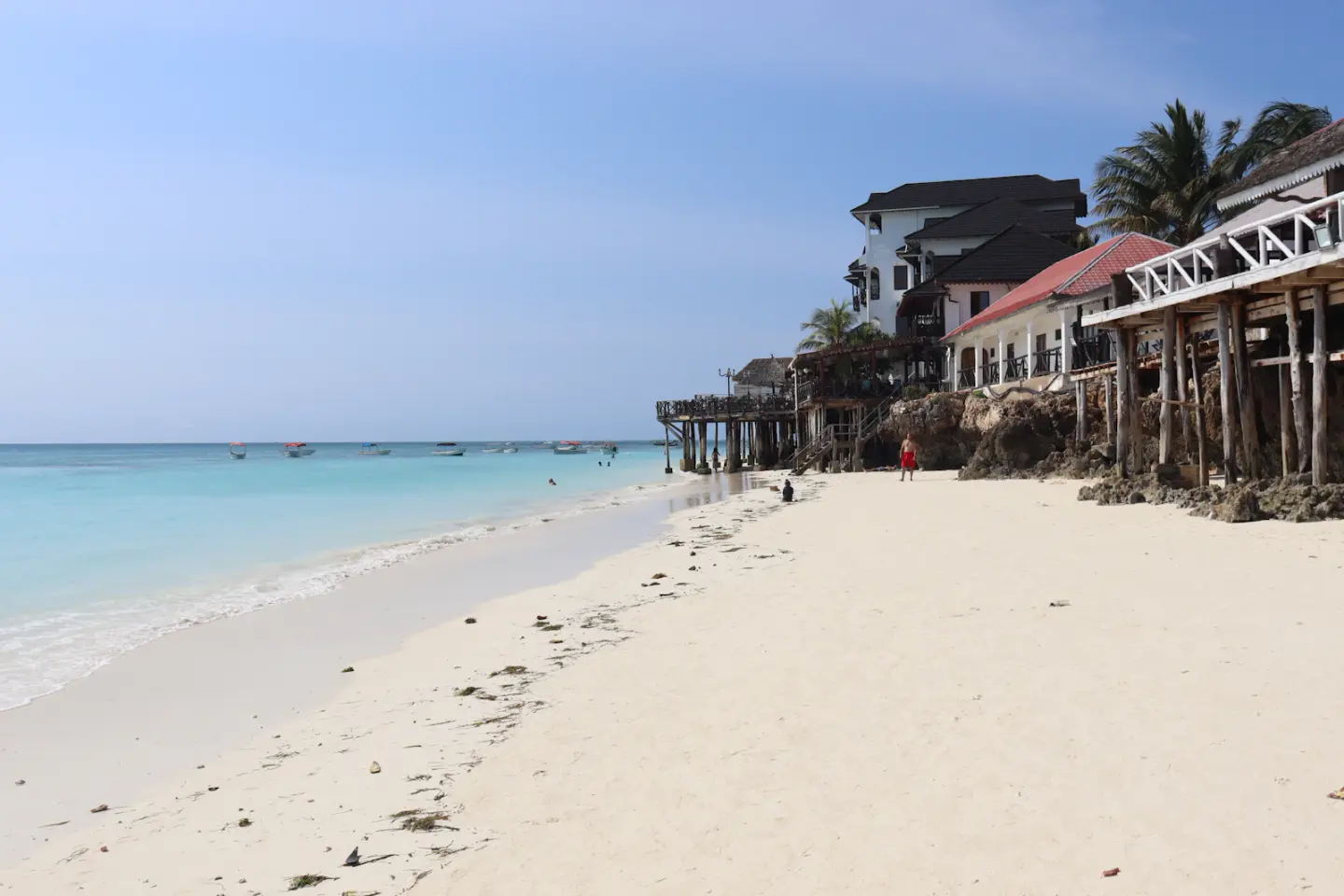White sand and waterfront buildings in Nungwi, Zanzibar